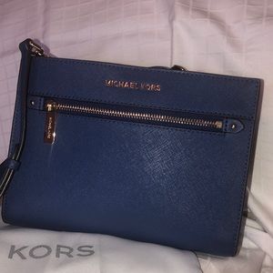 Michael Kors small blue handbag.